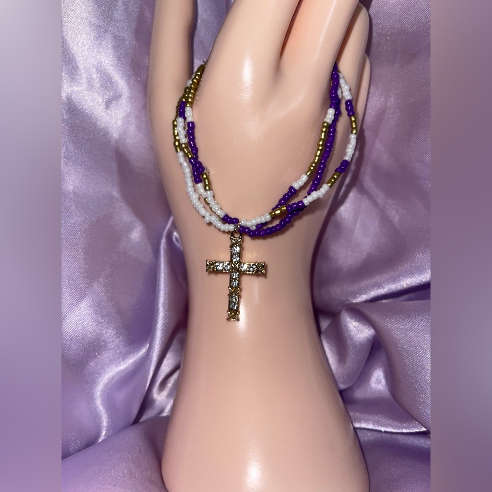 Cross charm bracelet